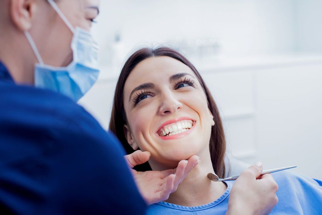 Woman getting a dental cleaning Yardley Pennsylvania